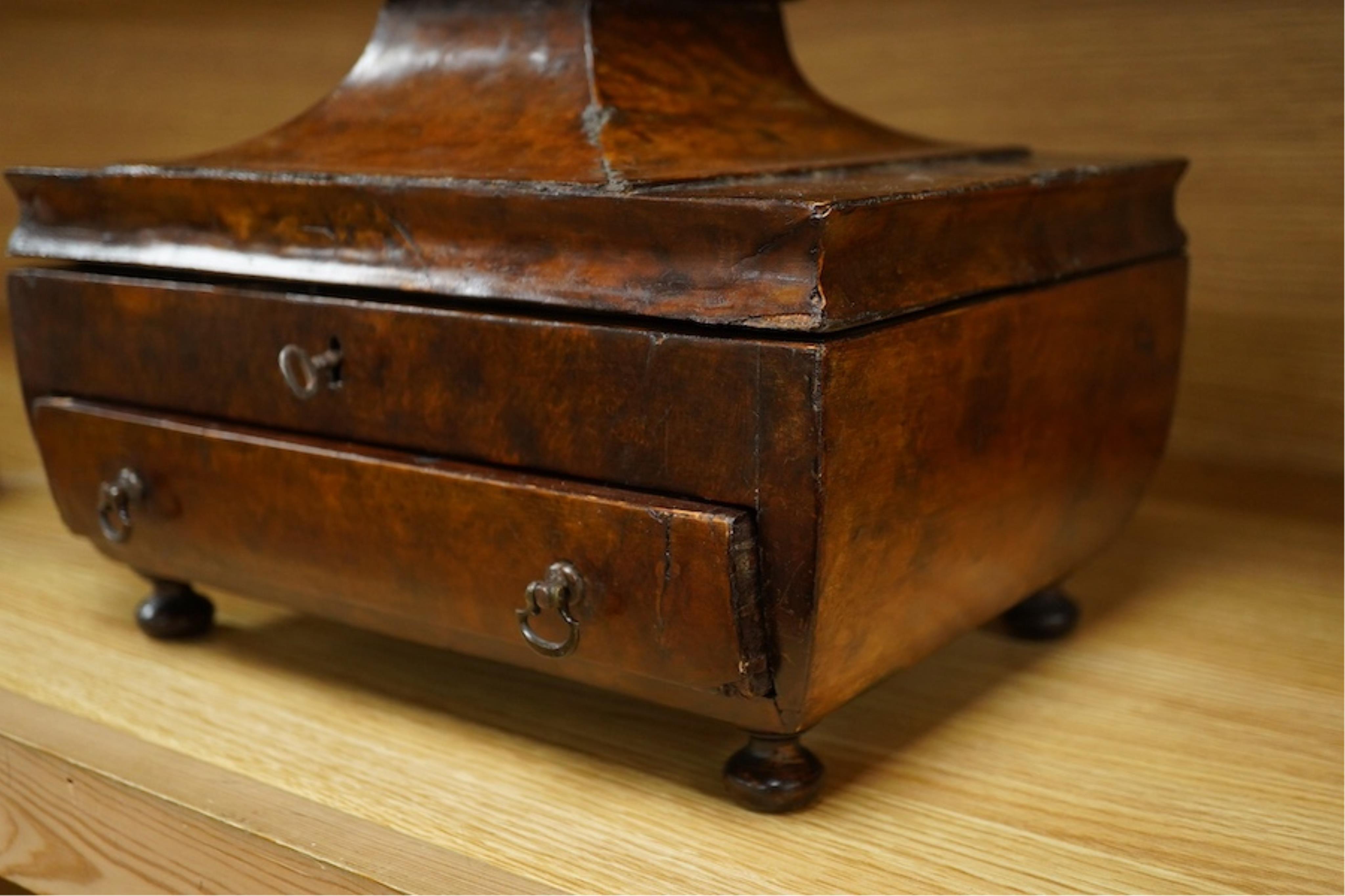 A Victorian burr walnut pagoda’ shaped sewing box incorporating a folding writing slope, 28cm wide. Condition - poor to fair